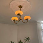 AuricLuxe Gold Finish Chandelier With Pink Glass Shades For Glam Modern Interiors