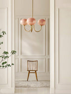 AuricLuxe Gold Finish Chandelier With Pink Glass Shades For Glam Modern Interiors
