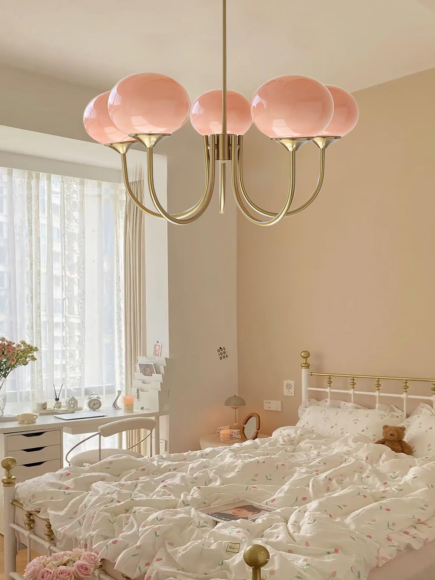 AuricLuxe Gold Finish Chandelier With Pink Glass Shades For Glam Modern Interiors