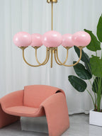 AuricLuxe Gold Finish Chandelier With Pink Glass Shades For Glam Modern Interiors