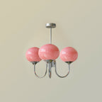AuricLuxe Gold Finish Chandelier With Pink Glass Shades For Glam Modern Interiors